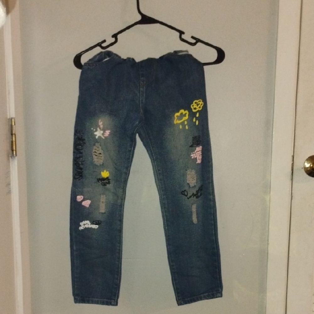 Embroidered Blue Jeans with Colorful Patches